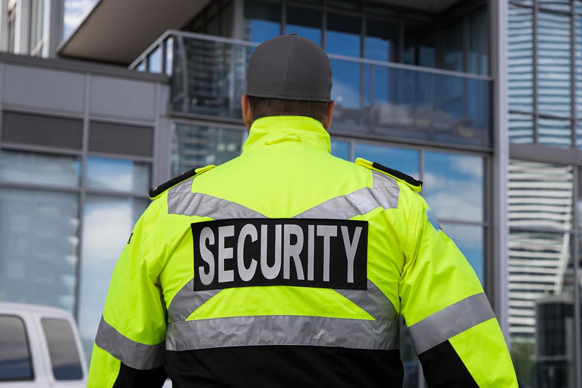 A security guard patrolling in a residential area